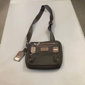 Tumi Black and Brown Messenger Bag for Everyday Use